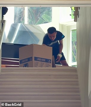 Boxes of belongings were taken from the home by a removals company on Wednesday afternoon