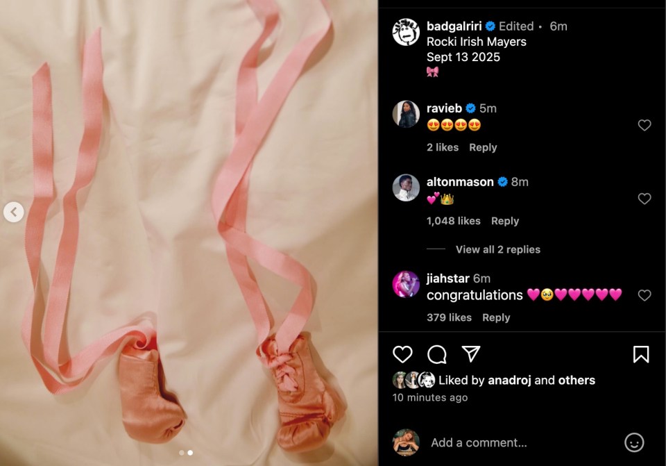 An Instagram post by Rihanna featuring baby shoes on a bed.