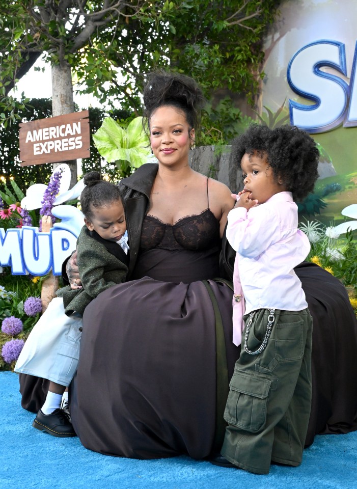 Rihanna with her two children at the Smurfs movie premiere.