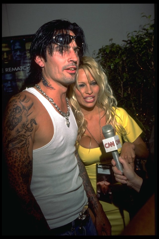 Tommy Lee and Pamela Anderson being interviewed by CNN.