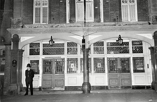 A Metropolitan Police officer stands guard outside the pub on March 9, 1966, after the killing