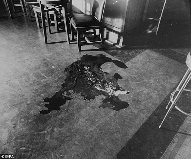 A pool of blood was left behind on the floor of the Blind Beggar after the shooting