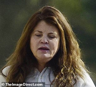 ... and walking her dog in Los Angeles in 2025 (right)