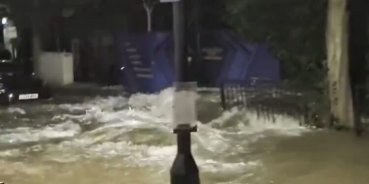 Moment burst pipe ERUPTS filling streets with thousands of gallons of water as locals evacuated