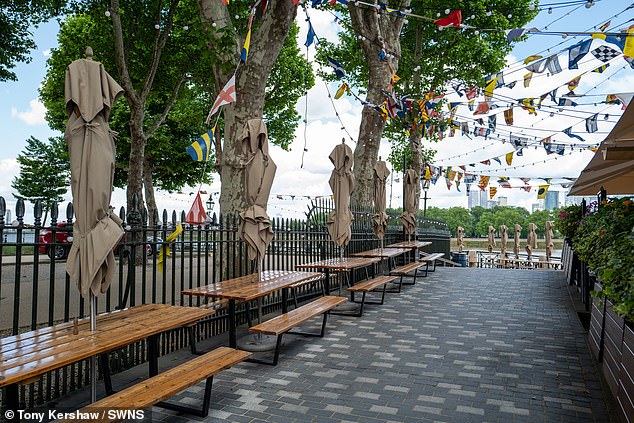 The al fresco tables are located on the Thames Path, a narrow walkway running along the banks of the capital's river