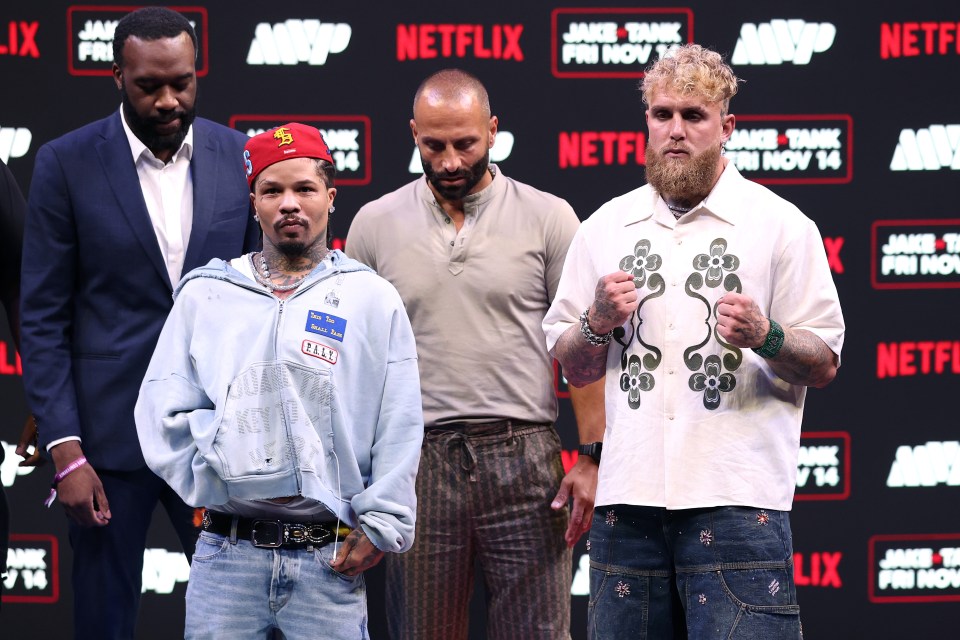 Gervonta "Tank" Davis and Jake Paul face off at a press conference.