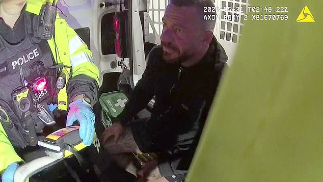 PC Dan Cuthbertson and his dog Louie were sent to the scene where Louie found a mobile phone belonging to Anderson (pictured, being given a roadside breathalyser test, which he failed)