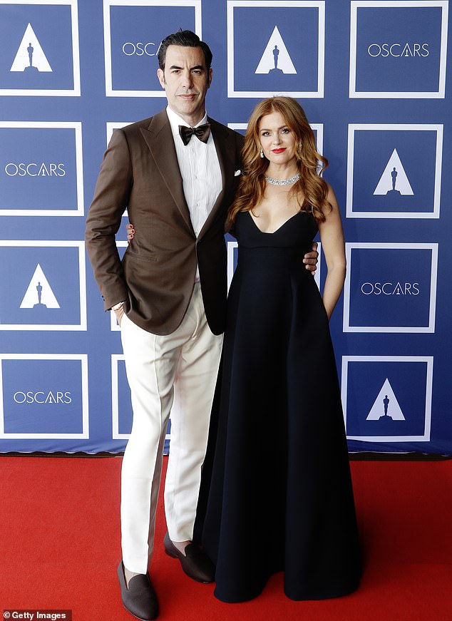Sacha and Aussie actress Isla, 49, split at the end of 2023 after 14 years of marriage and welcoming three children together (seen together in 2021)