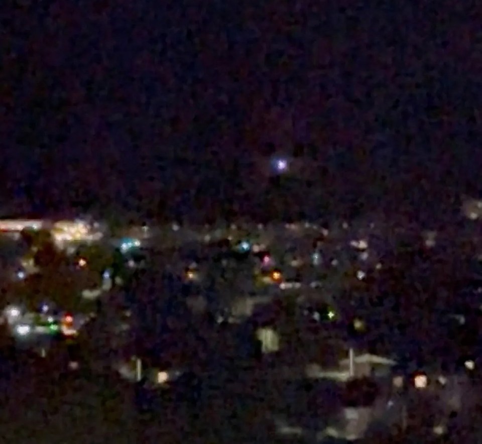 Light moving in the sky over Aalborg, Denmark, amid drone sighting reports.