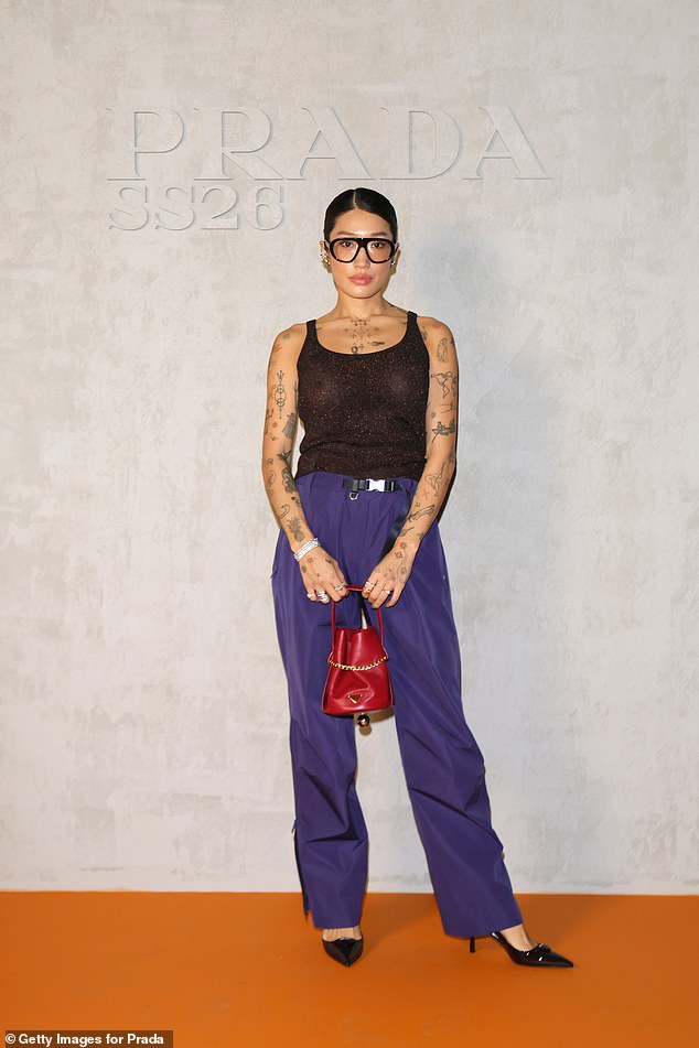 DJ Peggy Gou caught the eye in a sheer knitted vest and purple trousers