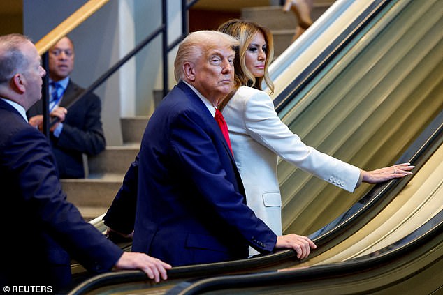 President Donald Trump (left) and First Lady Melania Trump (right) got stuck on a broken escalator and had to walk up the metal stairs when arriving at the UN General Assembly ahead of the president's address Tuesday morning
