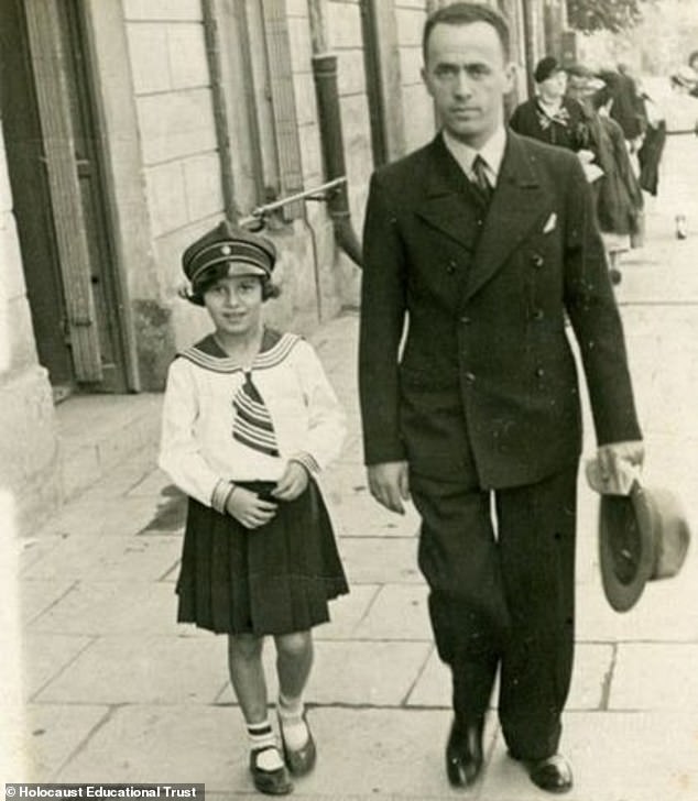 Ms Posner pictured as a girl with her father. She used a falsified passport to flee the Warsaw ghetto and posed as a Catholic school student during three years spent on the run