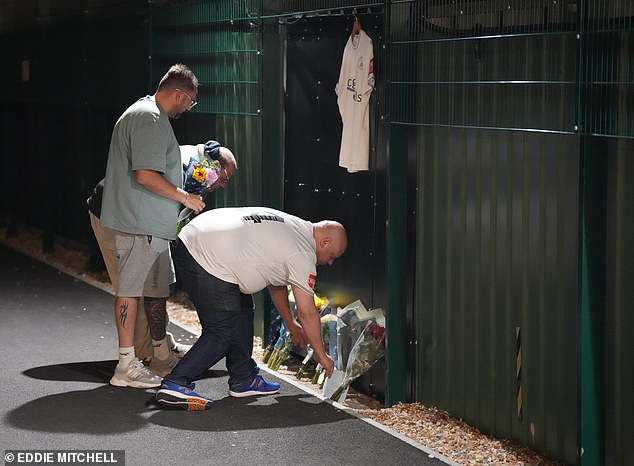 People have been placing flowers outside Chichester City's stadium in memory of Vigar