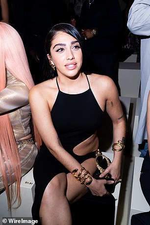 Lourdes flashed her dazzling white smile for the cameras