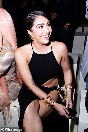 Lourdes flashed her dazzling white smile for the cameras