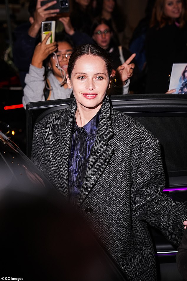 Fans surrounded her as she head to a fashion event
