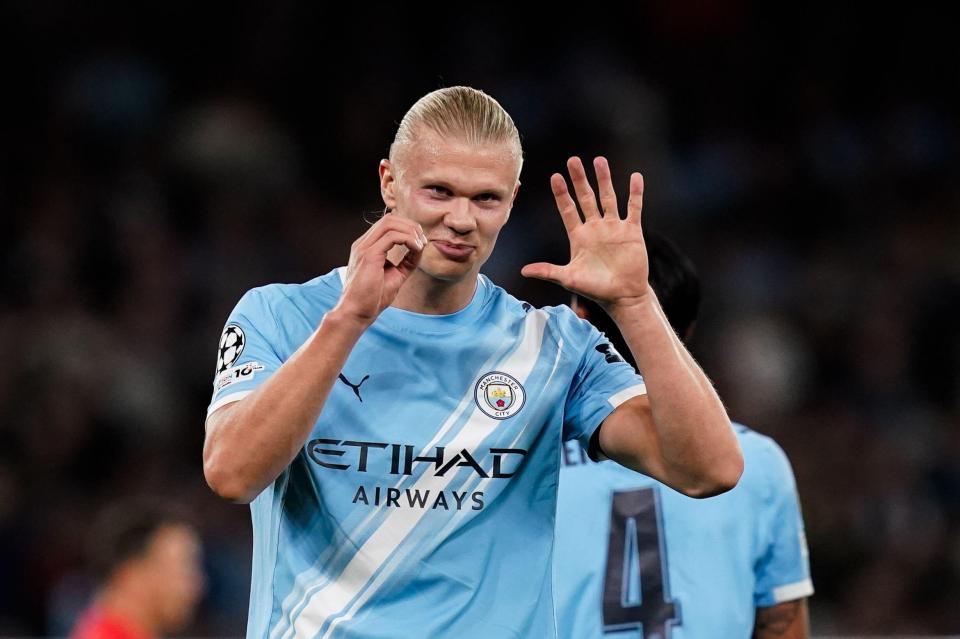 Erling Haaland celebrates his 50th Champions League goal for Manchester City.