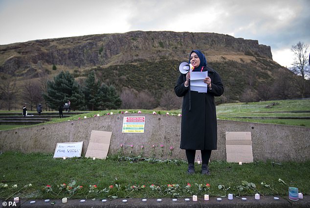 Farah Siddiq, from AMINA The Muslim Women's Resource Centre, speaks during a vigil being held in honour of Fawziyah
