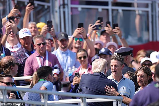 Trump chats to European players Justin Rose (second right) and Tommy Fleetwood (far right)