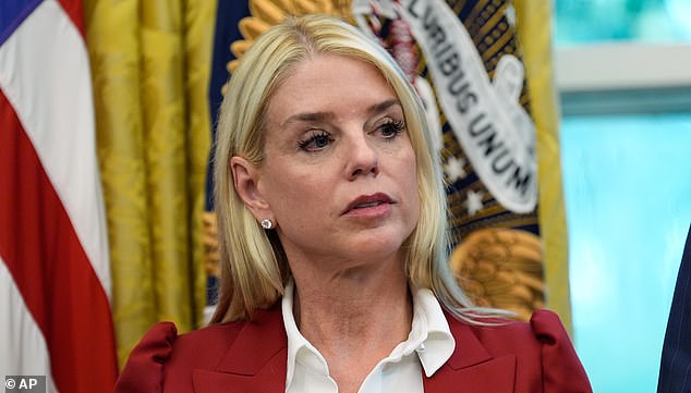 Attorney General Pam Bondi listens as President Donald Trump signs a presidential memorandum on the death penalty in the District of Columbia in the Oval Office at the White House, Thursday, Sept. 25, 2025, in Washington. (AP Photo/Alex Brandon)