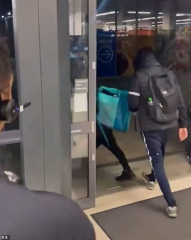 They brazenly walk out through the shop and past checkout with the stolen items as staff and customers watch on in disbelief