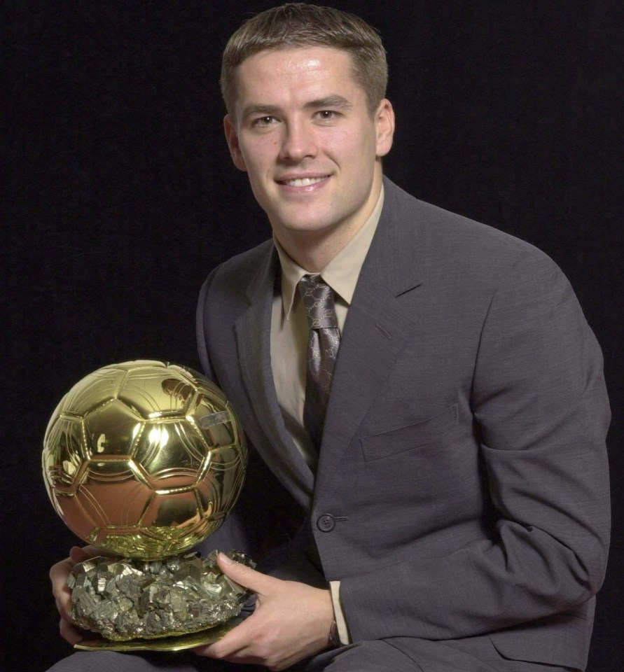 Michael Owen holding the Ballon d'Or.