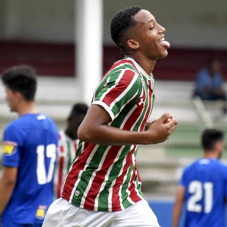 Joao Pedro of Fluminense celebrates while sticking out his tongue.