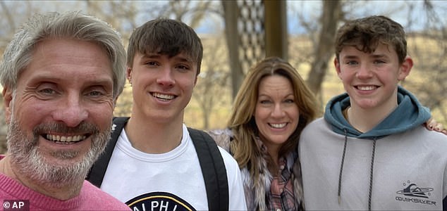 The family of Barnaby Webber, second left, with his father David Webber, left, mother Emma and brother Charlie