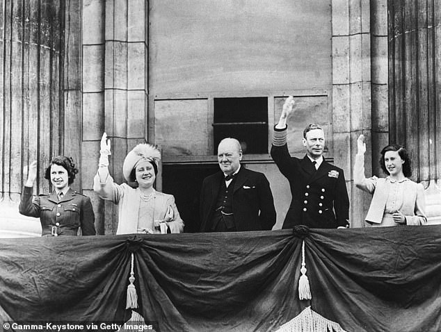 From left to right: Princess Elizabeth, the Queen Mother, Winston Churchill, King George VI and Princess Margaret on the balcony at Buckingham Palace on Victory Day 1945
