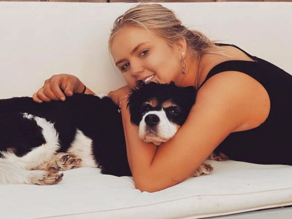 Hannah Byrne, 16, hugging her dog Charlie.