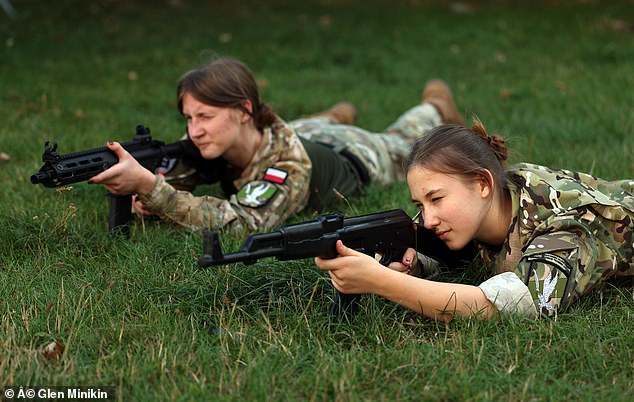 Had the lesson been staged in Britain, it would doubtless have brought the teachers' union out on strike. Pictured: Pupils at the school in Warsaw which offers military training as part of its curriculum