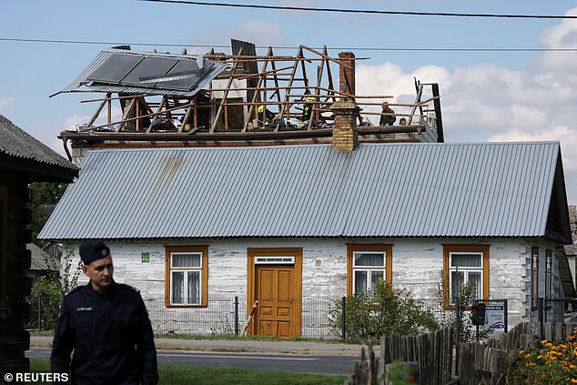 So, with the whiff of war fever growing ever stronger, what is the mood of the 38million Poles?. Pictured: A roof destroyed at a home in the Polish village of Wyryki after Russian drones violated the country's airspace on September 10, 2025