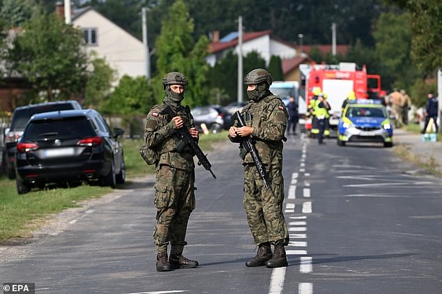 Eager to capitalise on the nation's angst, a Lodz-based company called Schron.pro recently started making bomb shelters. Pictured: Soldiers patrolling the street where a drone struck a roof in Poland on September 10, 2025