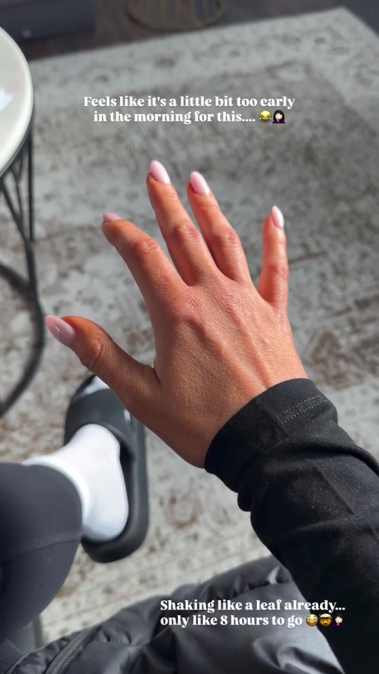 Vicky Pattison's shaky hand with pink nails due to early morning and pre-show nerves.
