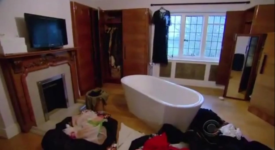 Adele's rented mansion bedroom with a freestanding bathtub in the middle.