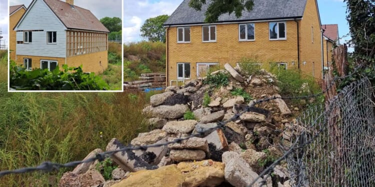 Abandoned UK new-build estate is left to rot with piles of rubble, piping & boarded-up doors in 'soul-destroying' pics