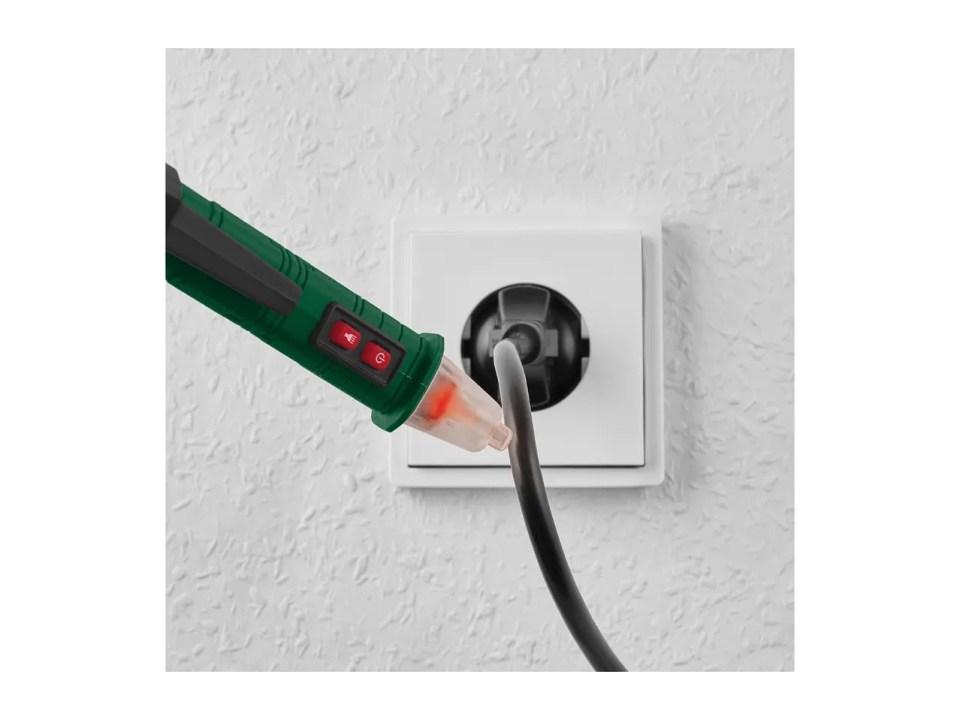 Cable tester indicating electricity flowing through a power outlet.