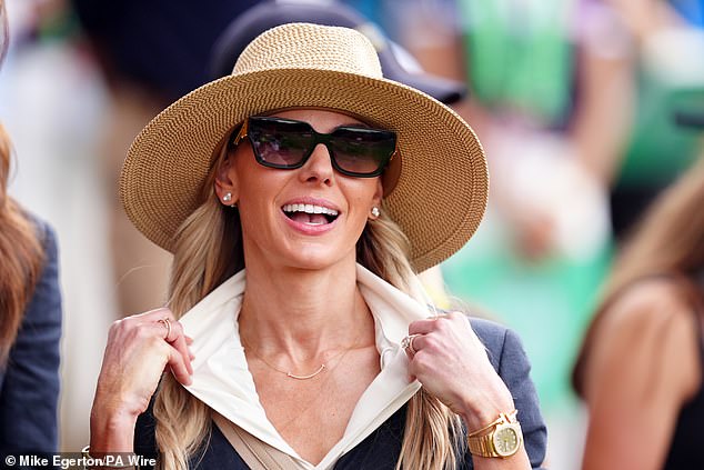 His wife, Erica, was among the wives and girlfriends at the Ryder Cup on Friday