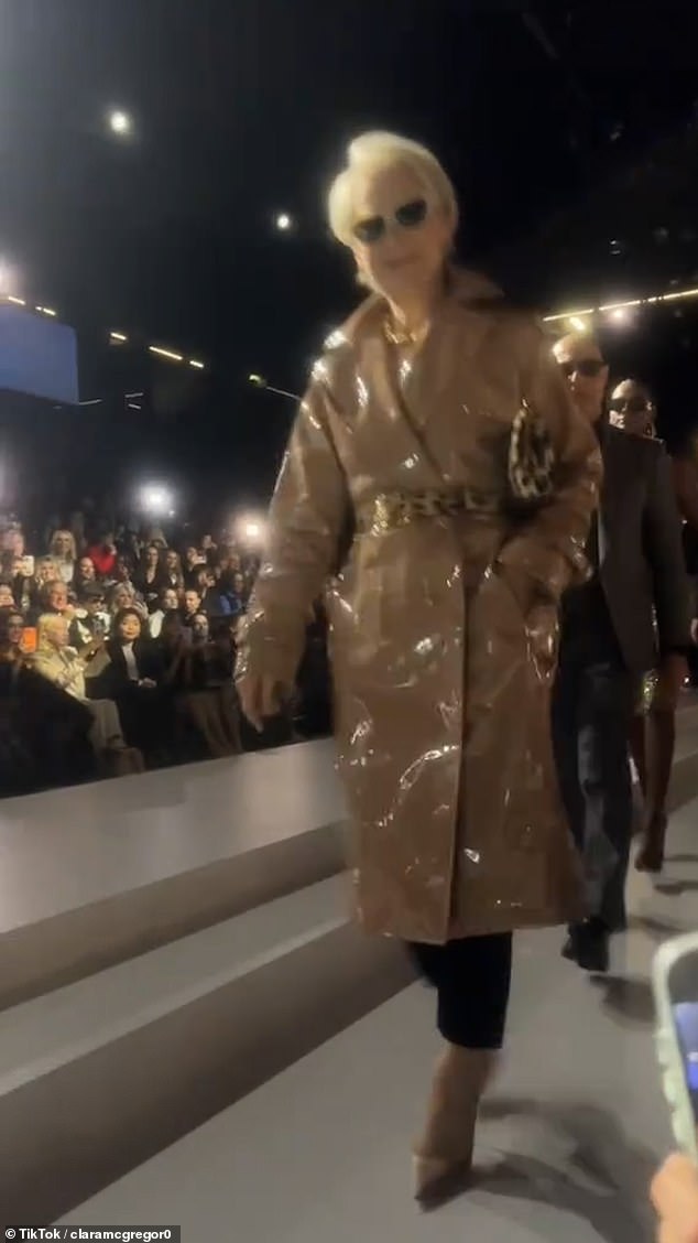 Meryl, 76, who is back playing her role as esteemed 'Runway' magazine editor-in-chief Miranda Priestly, looked the epitome of chic in a tan coloured coat, that was cinched with a leopard print belt