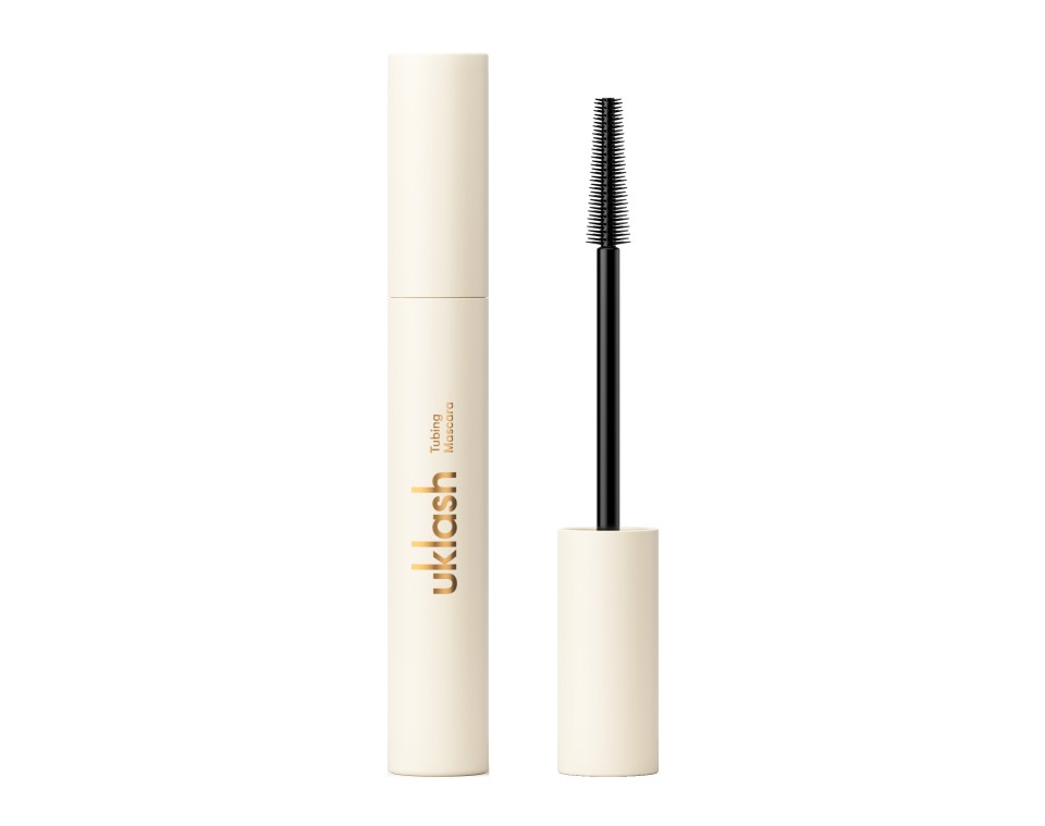 UKLASH Tubing Mascara in an off-white tube with the wand next to it.