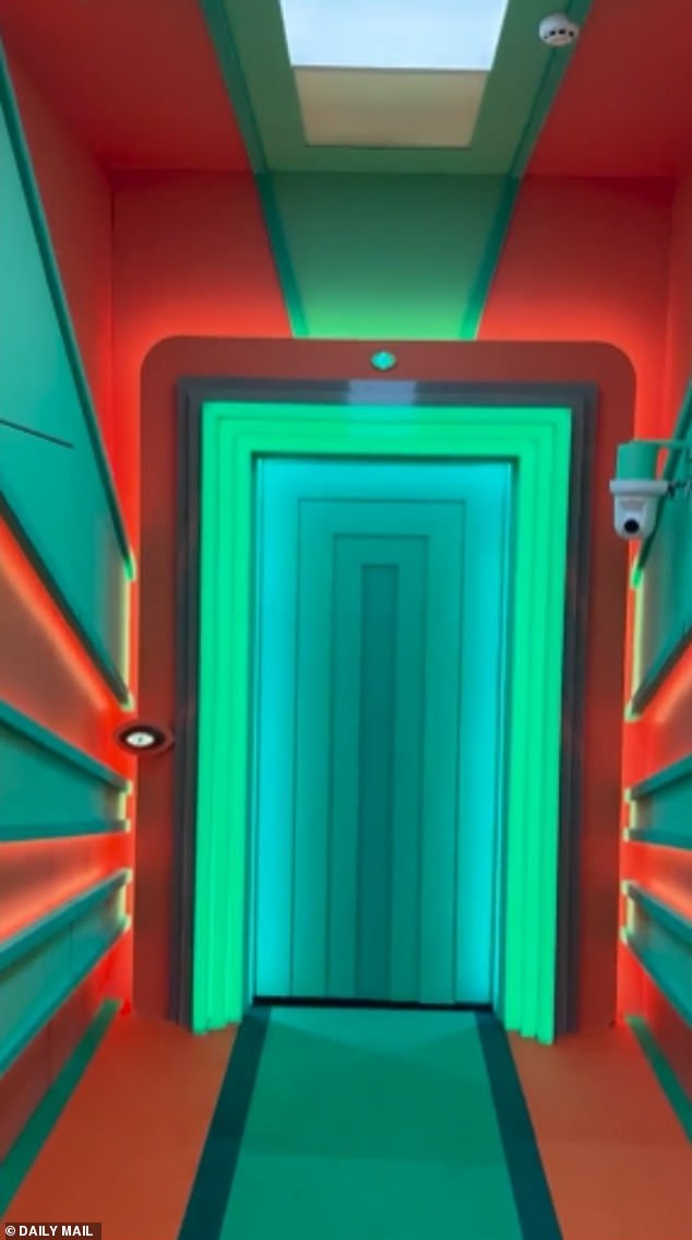 The walk up to the Diary room is colourful too, with red and turquoise panelling and bright lighting - as well as a colourful flashing lights door
