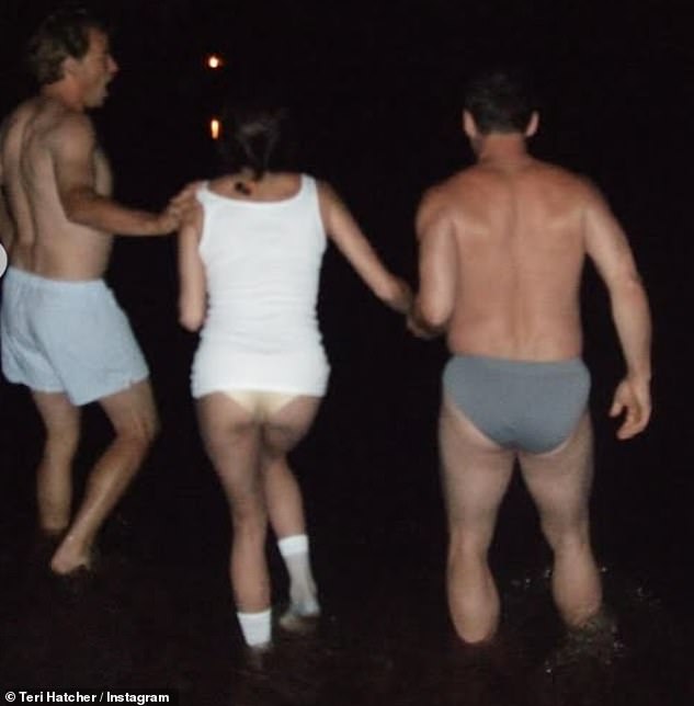 The 60-year-old posted a snap of herself dripping wet - wearing a white tank top over no bra - as she emerged from a lagoon in Kenya during a night swim