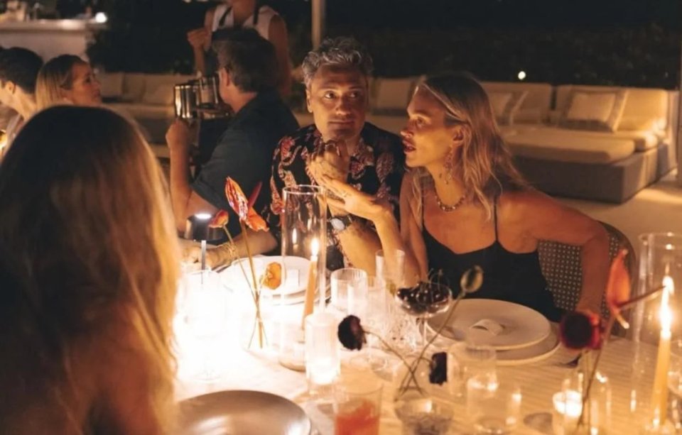 Taika Waititi and Rita Ora at a 50th birthday party.