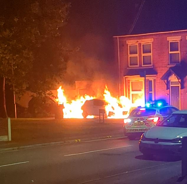Shocking footage shows huge orange and red flames engulfing a car parked outside of a house in Bilston, Wolverhampton