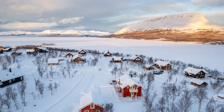 The perfect Christmas destination for families - with snowmobiles, husky-drawn sled rides & getting to meet Santa