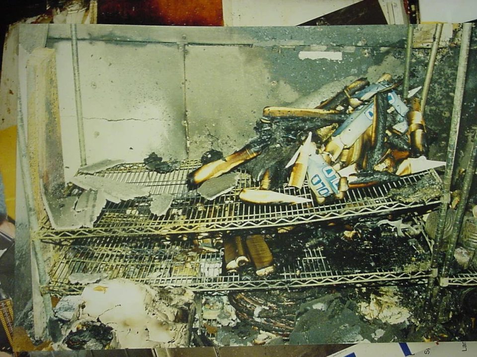 Charred contents of a storage room in the I Can't Believe It's Yogurt shop.