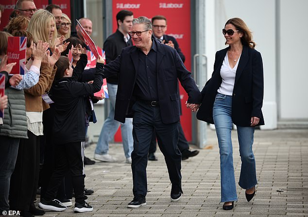 Sir Keir arrived at party conference with wife Victoria yesterday