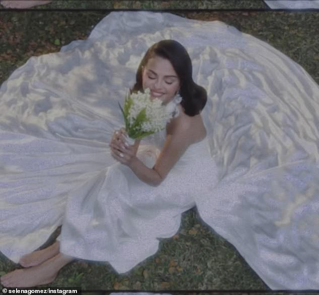 Gomez also posed while sitting alone on the grass, beaming with anticipation of her nuptials as she held her bridal bouquet up to her face to catch a whiff of its aroma