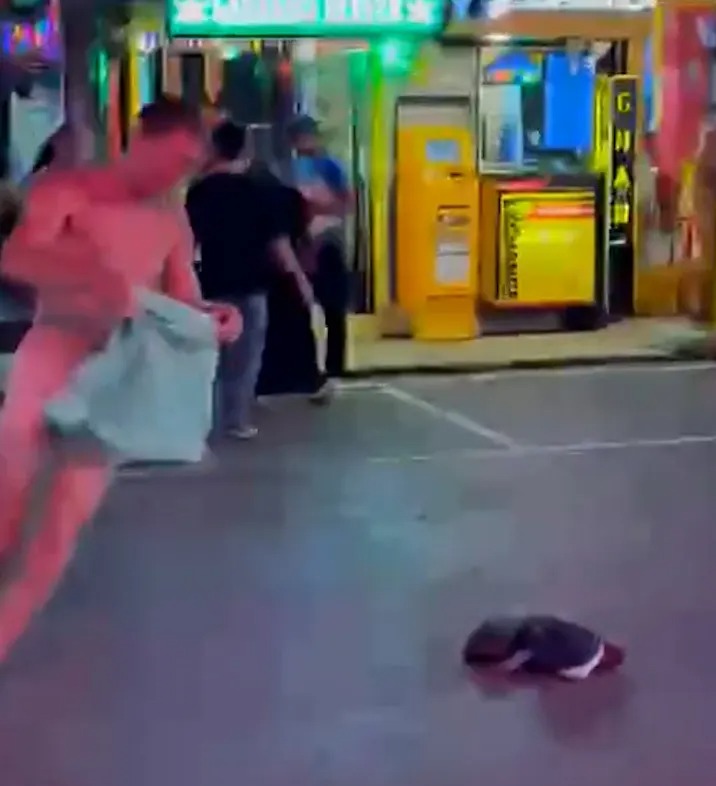 Aidan Jesse Phillimore dancing naked in the middle of Walking Street in Phuket.