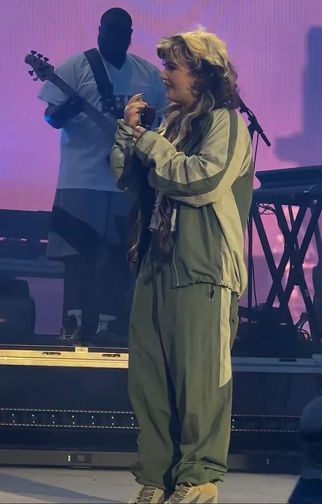The singer, best known for her 2024 hit Messy, was singing Conceited at Forest Hills stadium (pictured) when she suffered the worrying ordeal